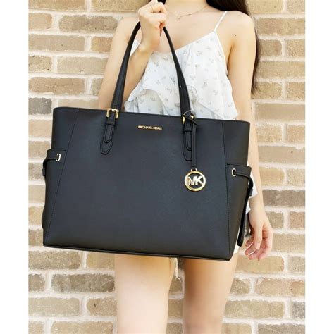 michael kors jet set pocket tote black|Michael Kors jet set saffiano.